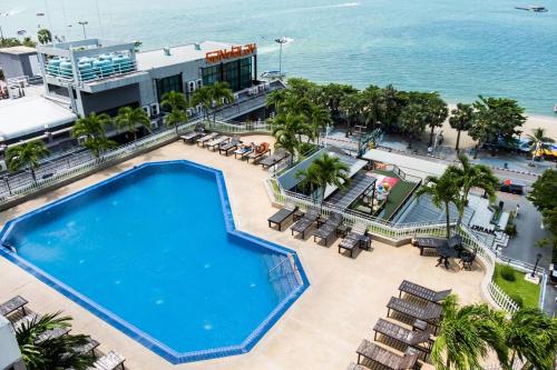 an overhead view of the pool at the oceanfront resort at Markland Seaside Pattaya in Pattaya