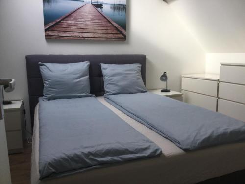 Katil atau katil-katil dalam bilik di Appartementen Purmerend A
