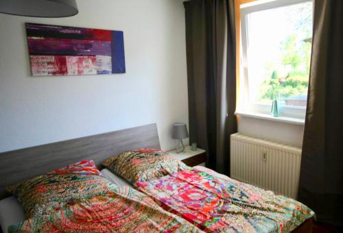 Cama ou camas em um quarto em Schöne 3Zimmer Ferienwohnung direkt am Baalensee