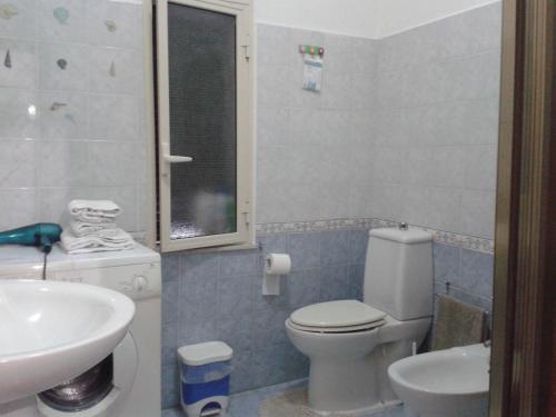Ein Badezimmer in der Unterkunft Catania House