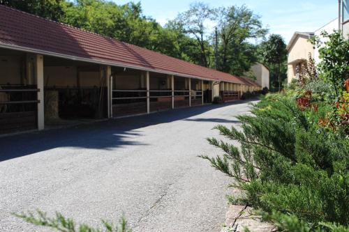 an empty road in front of a building at La Viscontina in Somma Lombardo