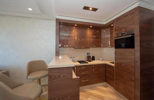 Una cocina o cocineta en Suite Hotel Casa Diamond