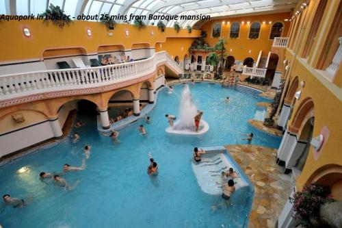 A view of the pool at Barokní fara Český ráj or nearby