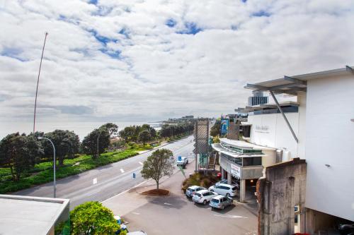 a view of a street with cars parked in a parking lot at Millennium Hotel New Plymouth, Waterfront in New Plymouth