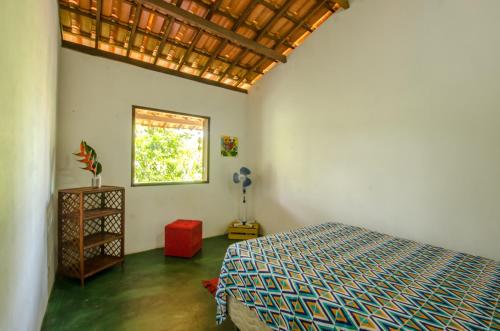 Postel nebo postele na pokoji v ubytování Casa da Pipoca
