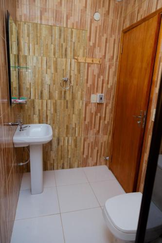 Koupelna v ubytování Class Apart Hotel