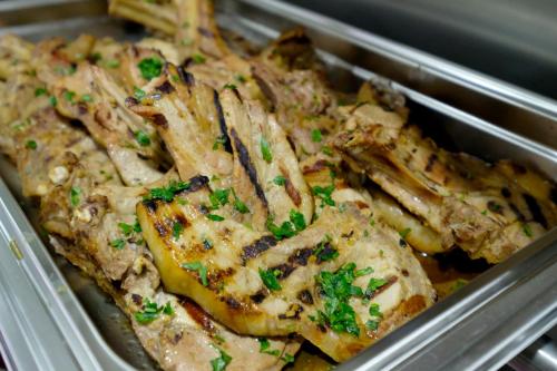 a metal container filled with chicken and french fries at Tantur Hills Hotel - Jerusalem in Jerusalem