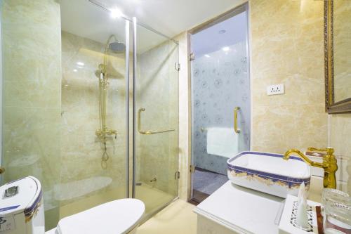 Koupelna v ubytování Golden Sail Hotel & Spa