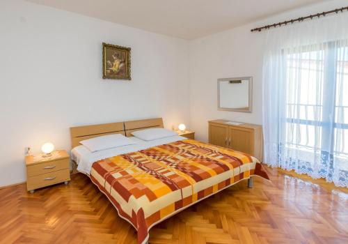 מיטה או מיטות בחדר ב-Apartments Matejka I