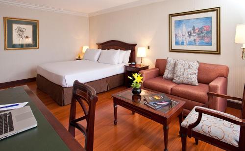 Ένα ή περισσότερα κρεβάτια σε δωμάτιο στο Santafe Boutique Hotel