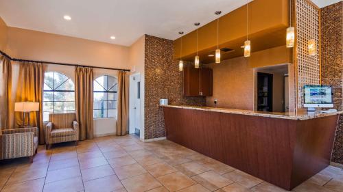 a large kitchen with a large counter top at Sure Stay Plus by Best Western Twentynine Palms Joshua Tree in Twentynine Palms