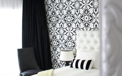 En eller flere senge i et værelse på Regent of Rotorua Boutique Hotel