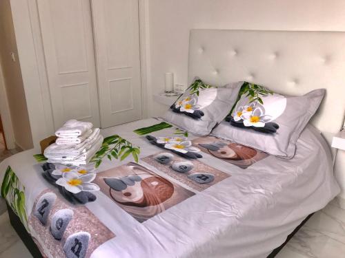 Postel nebo postele na pokoji v ubytování Appartement avec Solarium