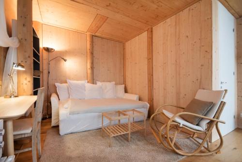a room with a bed and a desk and a chair at Apartments near metro station in Vienna