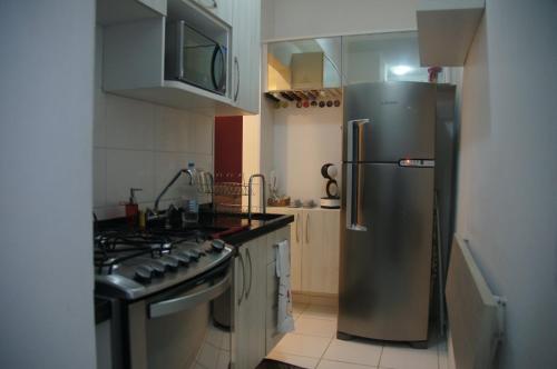 Kuchyň nebo kuchyňský kout v ubytování Apartamento Completo em Cotia - SP