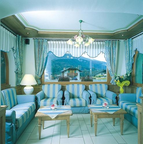 Zona de estar de Hotel Eccher 3 stelle Superior