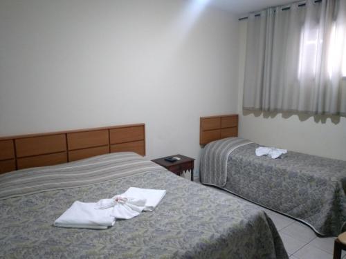 Postel nebo postele na pokoji v ubytování Summer Hotel