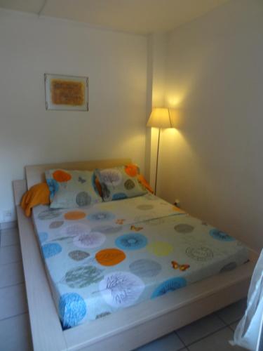 Postel nebo postele na pokoji v ubytování Residence Virginie