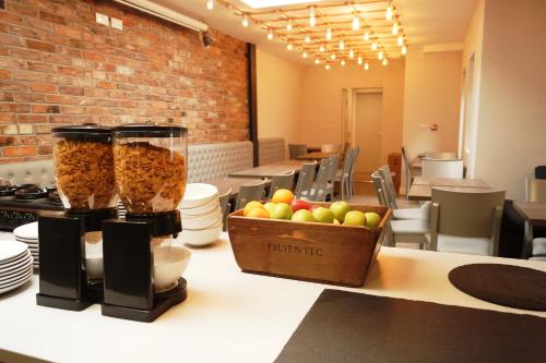 a kitchen filled with lots of fruits and vegetables at Euro Hotel in London