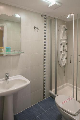 Koupelna v ubytování Magic Hotel