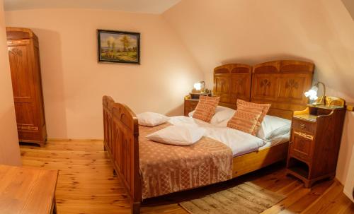 A bed or beds in a room at Boutique hotel Pracháreň