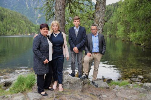 a group of people standing on a rock near a river at Haus Gstrein in Obergurgl