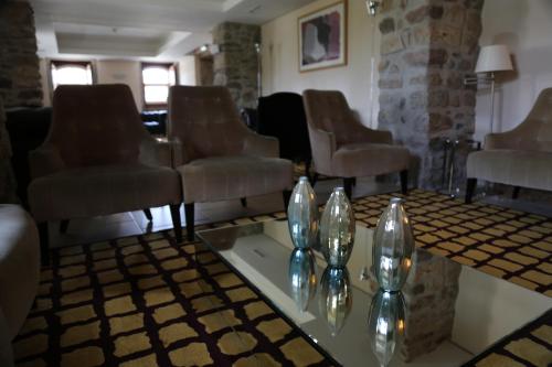 Posezení v ubytování INATEL Linhares da Beira Hotel Rural