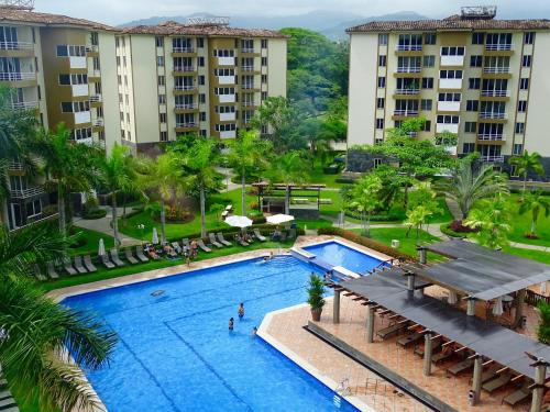 an overhead view of the pool at a resort at Jaco Beach Condos in Jacó