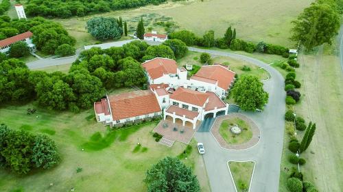 an aerial view of a house with a driveway at La Campiña Club Hotel & Spa in Santa Rosa