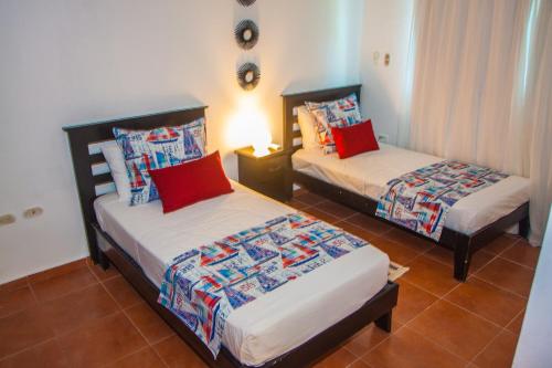 Ένα ή περισσότερα κρεβάτια σε δωμάτιο στο Cocotal Bavaro Apartments