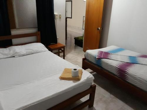 Katil atau katil-katil dalam bilik di HOTEL LA QUINTA