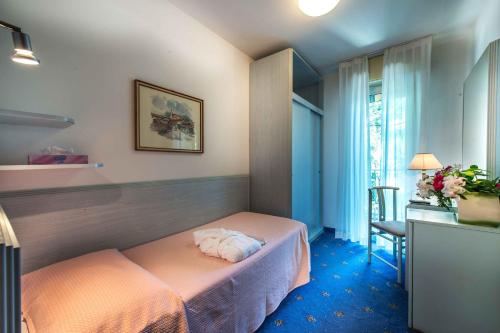 Postel nebo postele na pokoji v ubytování Hotel Meridianus