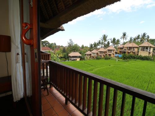 a view from the balcony of a resort at Biyukukung Suite & Spa in Ubud