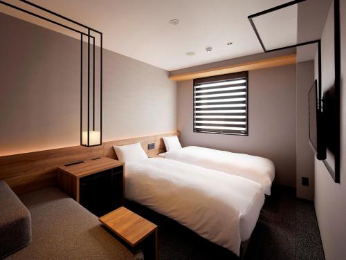 Легло или легла в стая в hotel androoms Shin-Osaka