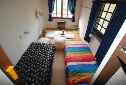 Postel nebo postele na pokoji v ubytování Chalet Madarao