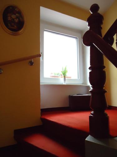 Ένα ή περισσότερα κρεβάτια σε δωμάτιο στο Hotel Sudenburger Hof