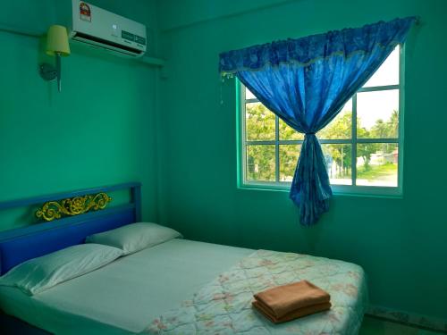 Postelja oz. postelje v sobi nastanitve Vila Thai