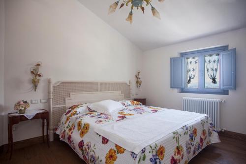 Posteľ alebo postele v izbe v ubytovaní Podere La Contessa B&B
