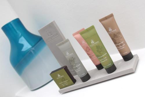 a group of five differentiatingials ofental products on a shelf at St John's Lodge incl off-site leisure club in Windermere