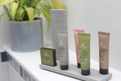 a shelf with a bunch of products on it at St John's Lodge incl off-site leisure club in Windermere