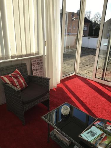 a living room with a couch and a coffee table at Apartment Gronau in Gronau