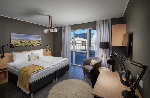 Postel nebo postele na pokoji v ubytování Alda Hotel Reykjavík