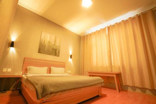 Postel nebo postele na pokoji v ubytování Monster B&B