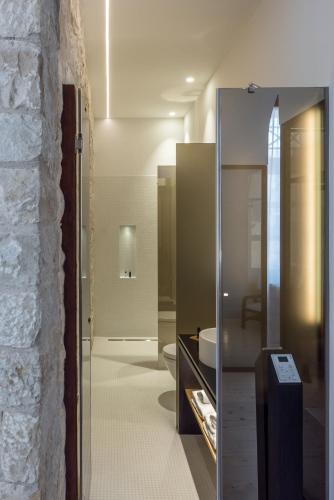 Ein Badezimmer in der Unterkunft S Paul City Hotel