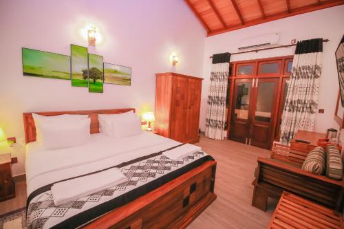 Postel nebo postele na pokoji v ubytování Villa Paradise