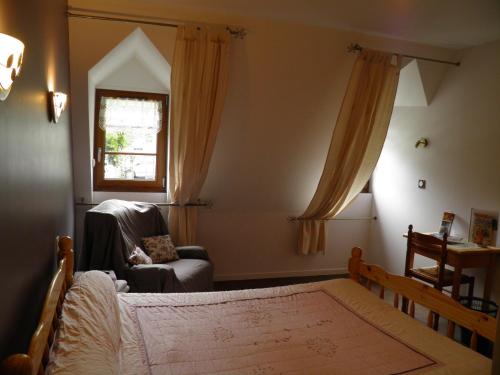Auberge des Pyrénéesにあるベッド