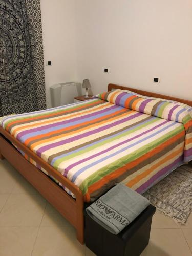 A bed or beds in a room at Alle Torri