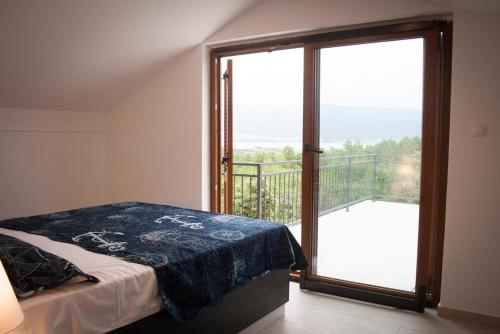 Postel nebo postele na pokoji v ubytování Vila Murvenica