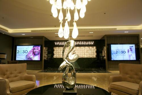Quetzal Aparthotelにあるテレビまたはエンターテインメントセンター