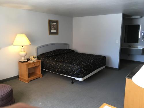 Ένα ή περισσότερα κρεβάτια σε δωμάτιο στο Americas Best Value Inn Billings